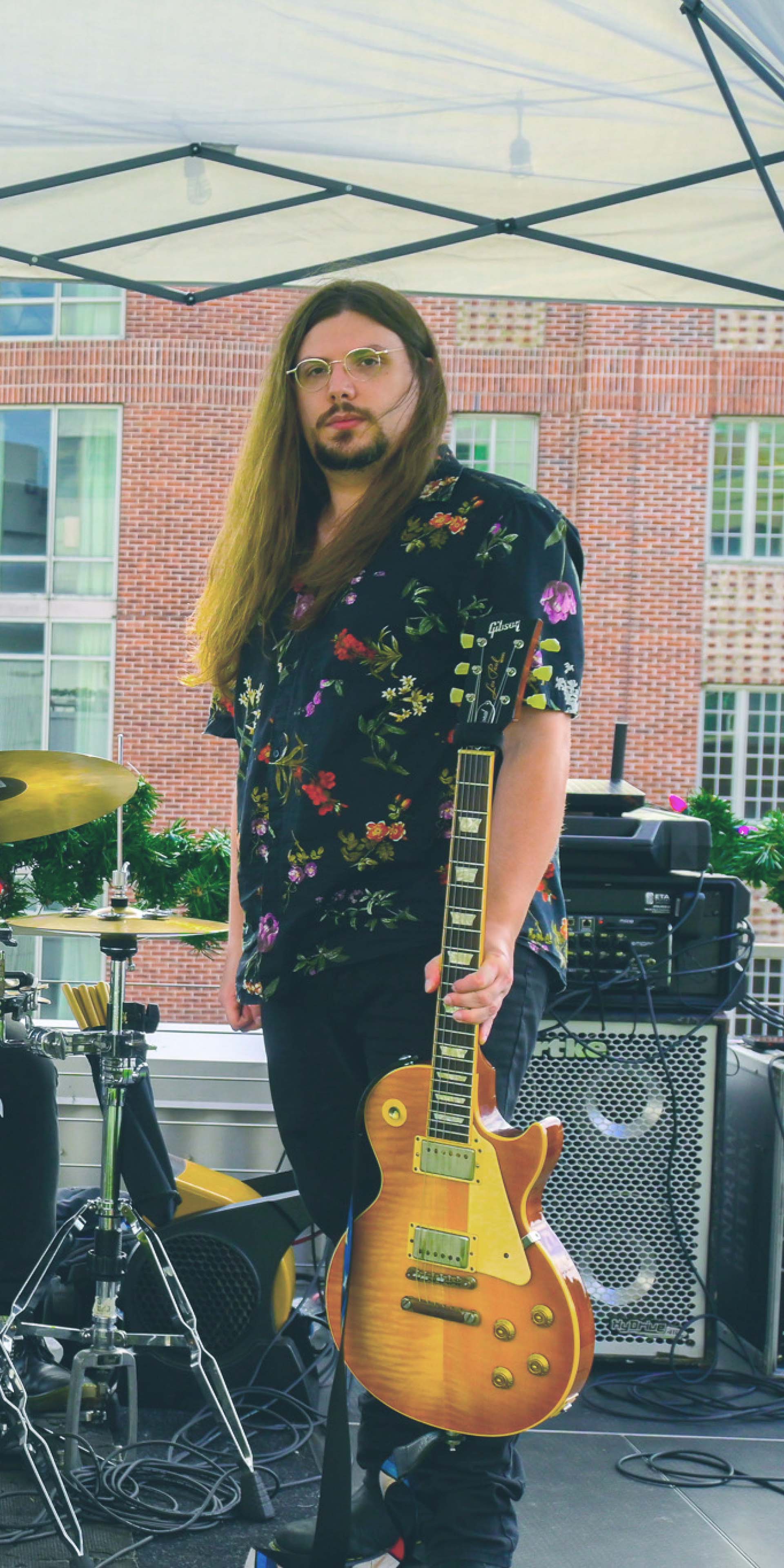 Individually Twisted band member posing at Plant Riverside